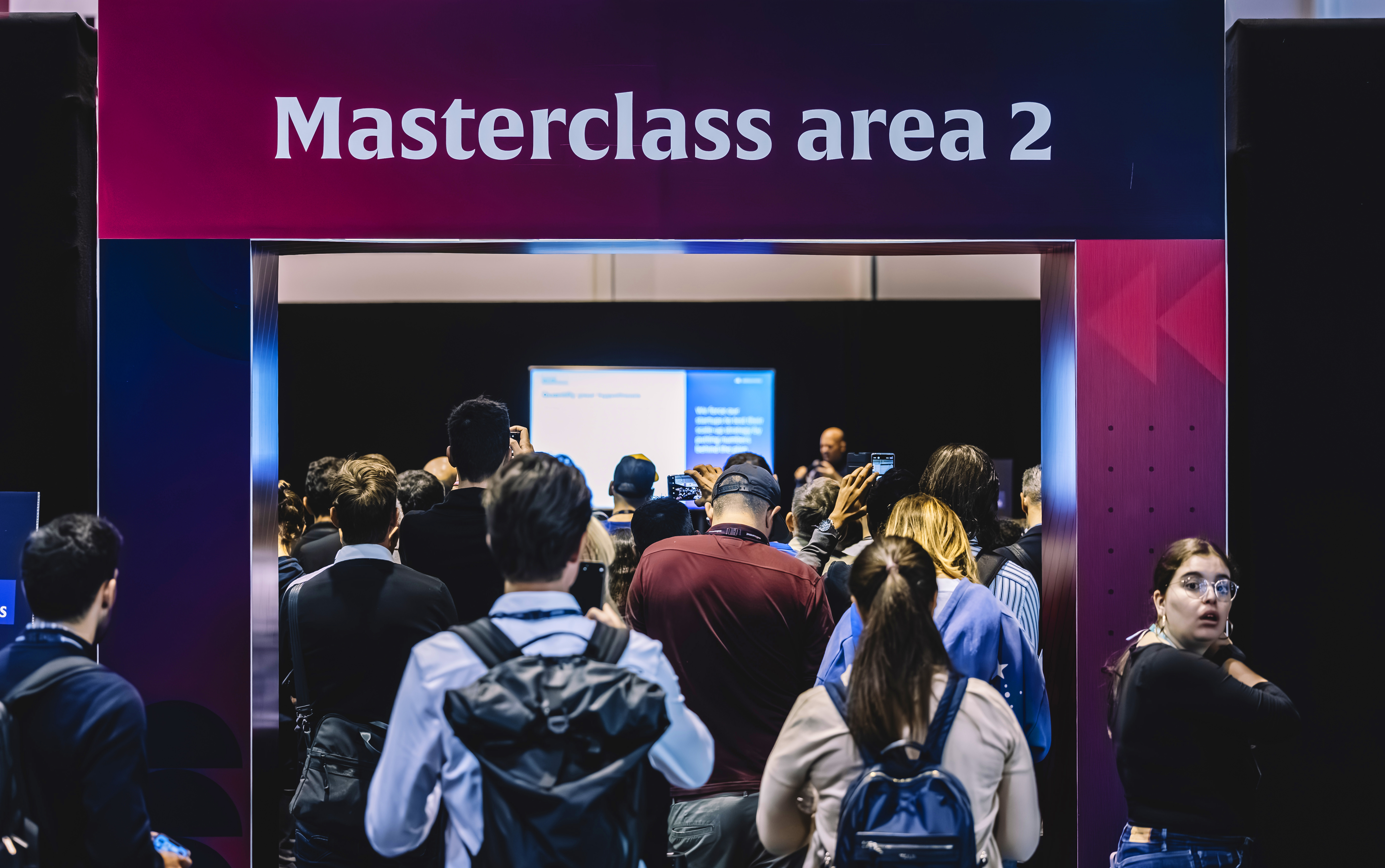 A crowd walking into Masterclass area 2 during Web Summit 2023