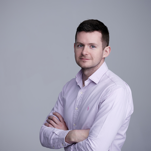 Headshot of Enzai founder Ryan Donnelly.