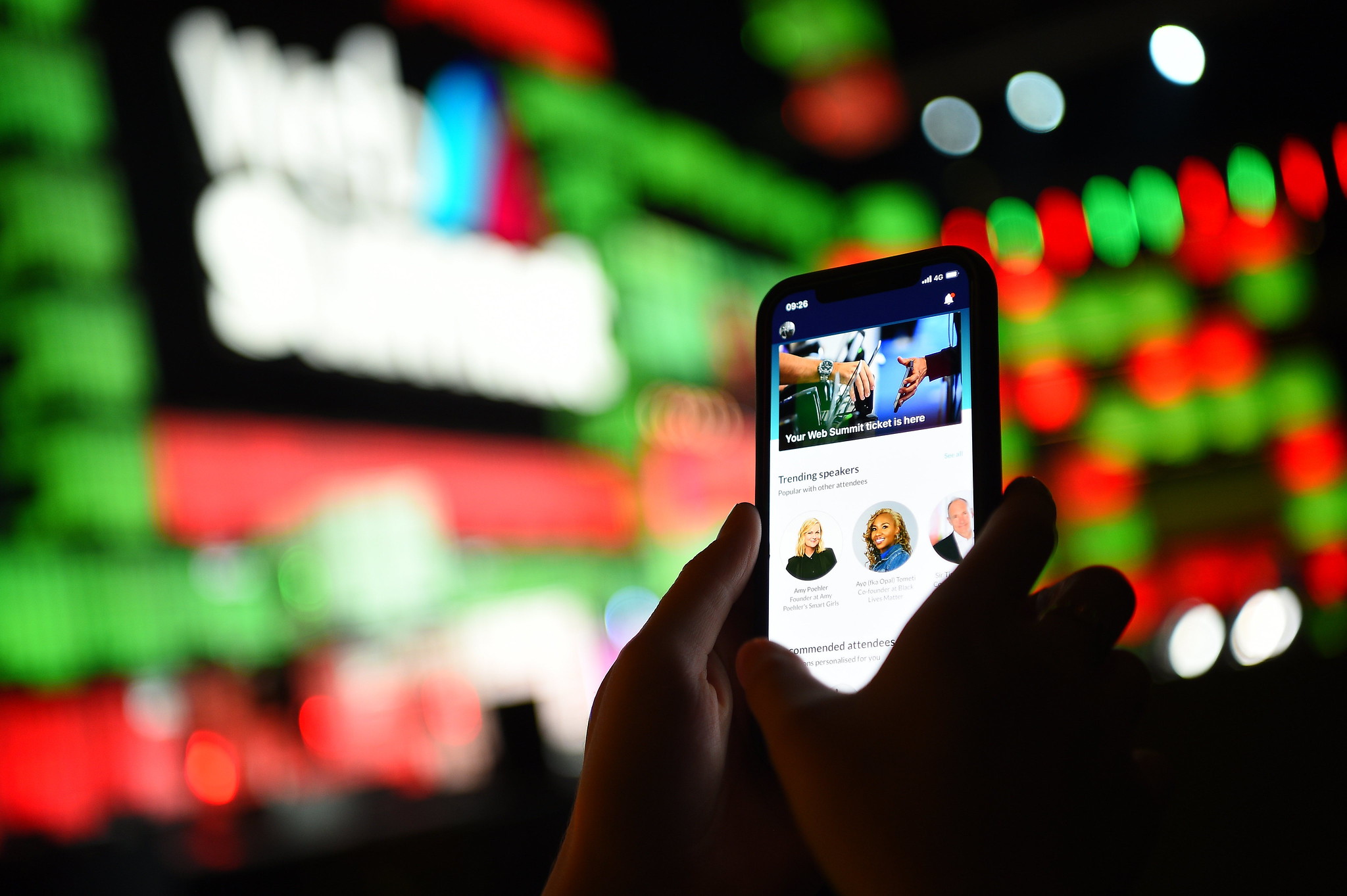 An attendee uses the Web Summit app during day two of Web Summit 2021 at the Altice Arena in Lisbon, Portugal