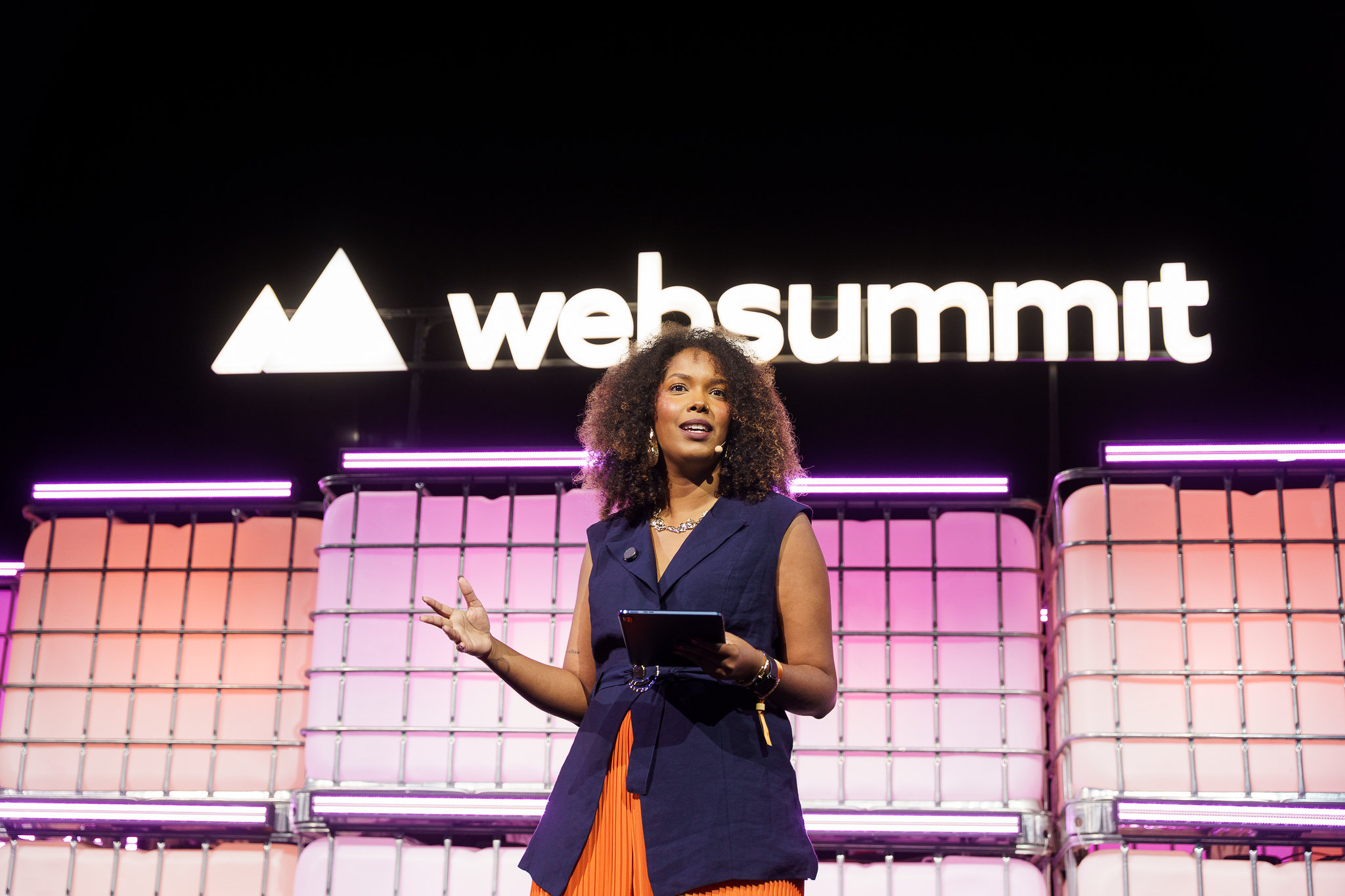 Amanda Graciano speaks at center stage at Web Summit Rio